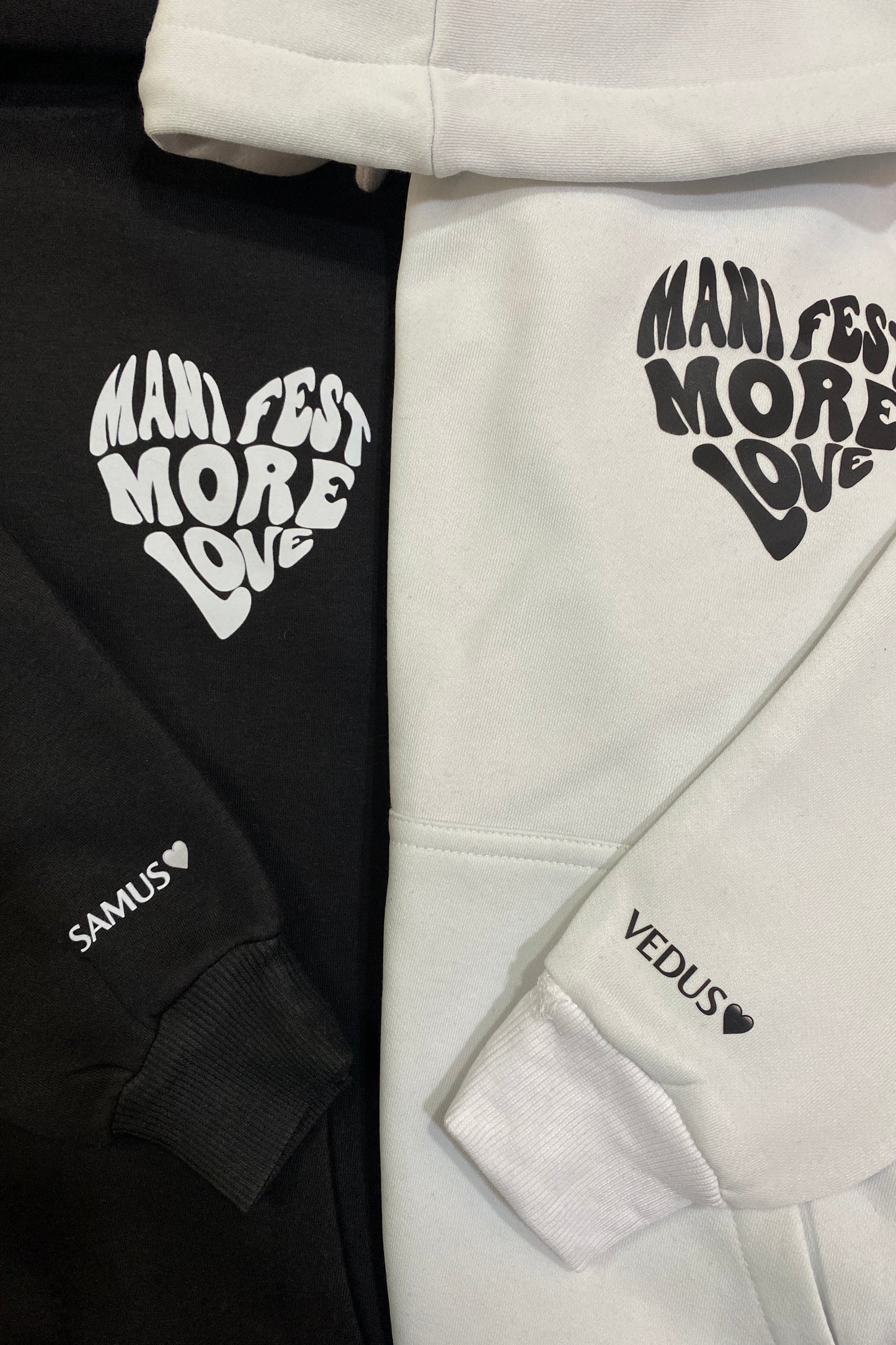 Pack of 2: Manifest More Love Couple Hoodies with Printed Sleeves (Tu Hai Toh, I'll Be Alright)